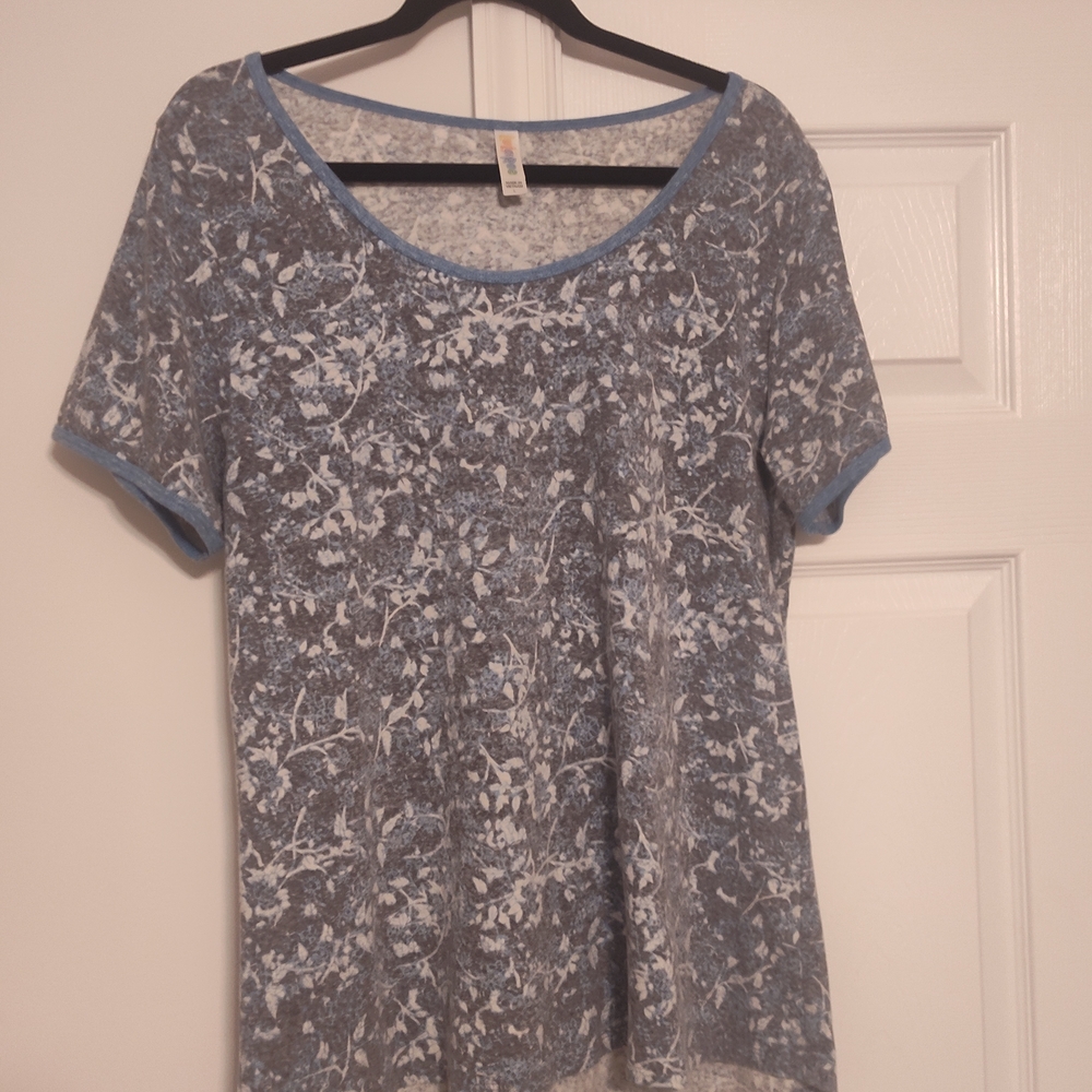 LuLaRoe Blue and White Floral Short Sleeve Top Size Large.